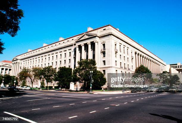 low angle view of a government building, justice department, washington dc, usa - dc parking stock pictures, royalty-free photos & images