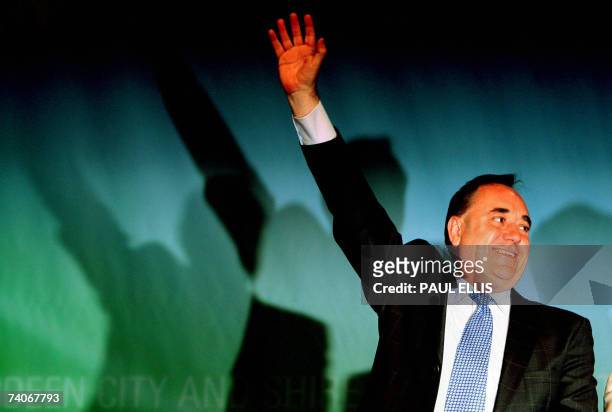 Aberdeen, UNITED KINGDOM: Scottish National Party leader Alex Salmond reacts following the result of the ballot of the Gordon constituency at the...