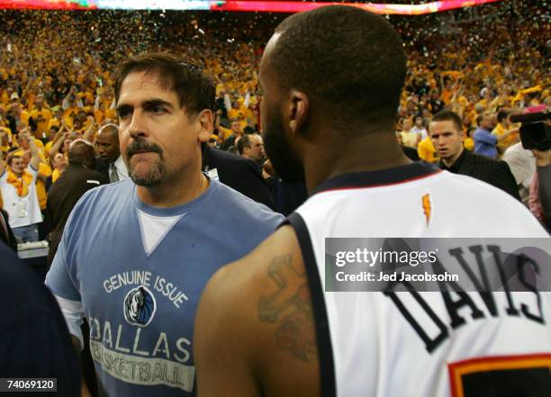 Baron Davis of the Golden State Warriors greets Mark Cuban, owner of the Dallas Mavericks after Game 6 of the Western Conference Quarterfinals during...