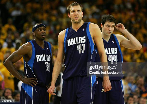 Dirk Nowitizki, Jason Terry and Austin Croshere of the Dallas Mavericks look on against the Golden State Warriors in Game 6 of the Western Conference...