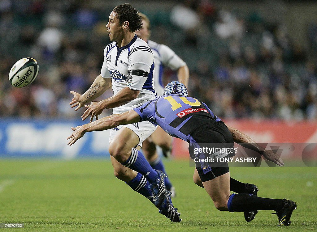 Australian Western Force Matt Henjak (R)...