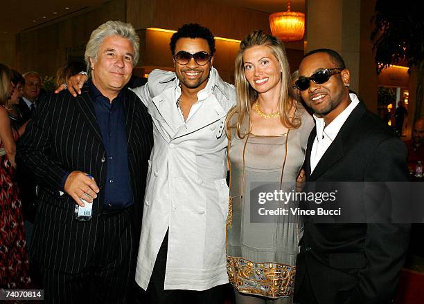 Producers Jon and Mindy Peters pose with singers Shaggy and Rayvon at the Los Angeles County Sheriff's Youth Foundation's annual "Salute To Youth"...