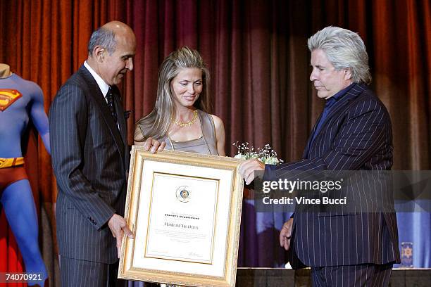 Sheriff Leroy D. Baca presents an award to producers Jon and Mindy Peters at the Los Angeles County Sheriff's Youth Foundation's annual "Salute To...