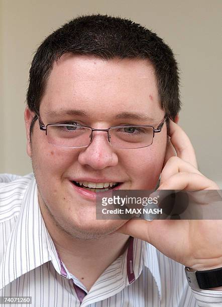 Brentwood, UNITED KINGDOM: Britain's youngest municipal councillor William Lloyd poses in his home in Brentwood, east of London, 04 May 2007, after...