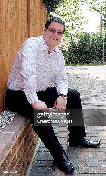 Brentwood, UNITED KINGDOM: Britain's youngest municipal councillor William Lloyd poses outside his home in Brentwood, east of London, 04 May 2007,...