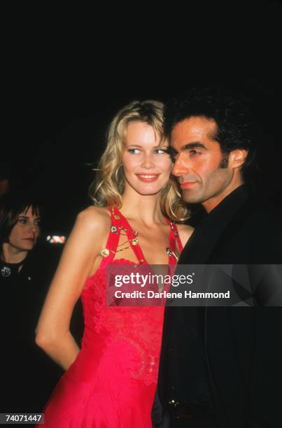 German supermodel Claudia Schiffer with her boyfriend, magician David Copperfield, circa 1995.