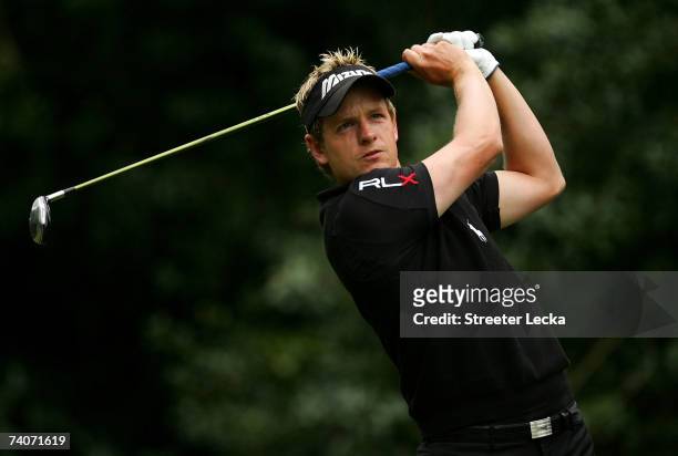 Luke Donald of England watches his tee shot on the 14th hole during the second round of the Wachovia Championship at Quail Hollow Country Club on May...