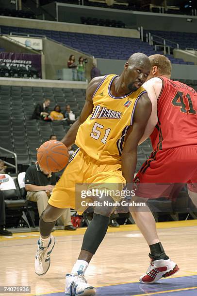 Babacar Camara of the Los Angeles D-Fenders dribbles against Lance Allred of the Idaho Stampede during the game on March 30, 2007 at Staples Center...