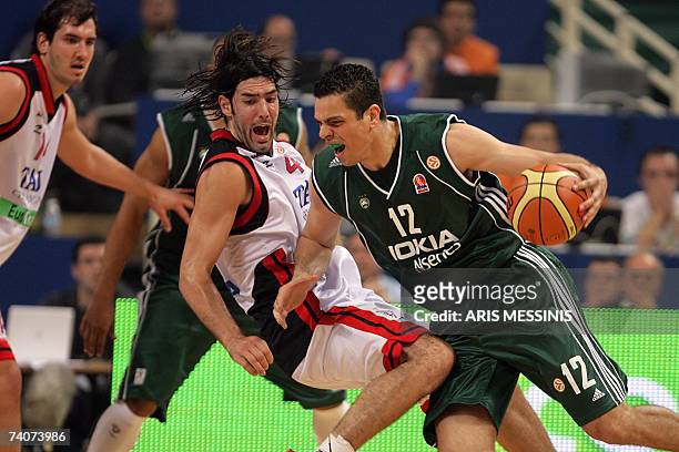 Luis Scola of Spain's Tau Ceramica tries to block Kostas Tsartsaris of Greece's Panathinaikos during their Euroleague semi-final basketball game at...