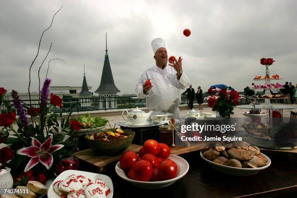 Kentucky Derby Chef Gil Logan juggles during a photo op on the day before the running of the 133rd Kentucky Derby on May 4, 2007 at Churchill Downs...