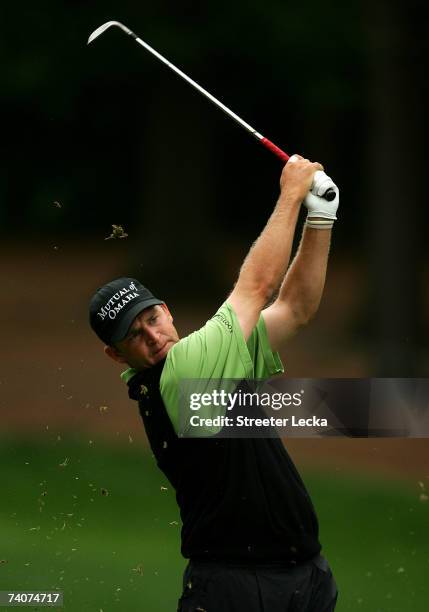 Jason Bohn watches a shot from the 10th hole during the second round of the Wachovia Championship at Quail Hollow Country Club on May 4, 2007 in...