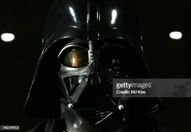 The original costumes for Star Wars character Darth Vader stand on display at 'Star Wars: The Exhibition' at County hall on May 04, 2007 in London,...