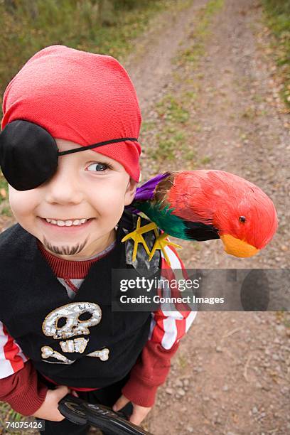 boy dressed as a pirate - parrot shoulder stock pictures, royalty-free photos & images