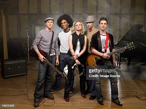 portrait of a rock band - rock musician stock pictures, royalty-free photos & images