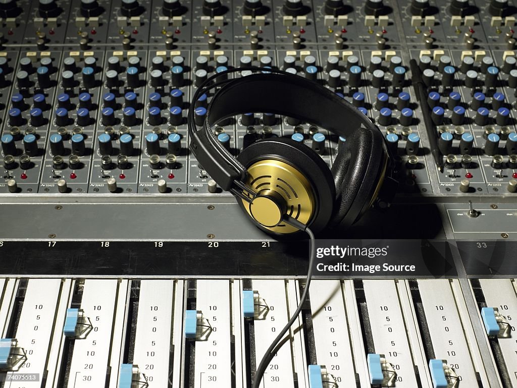 Headphones on a mixing desk