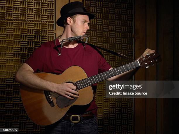 guitarist - harmonica stock pictures, royalty-free photos & images