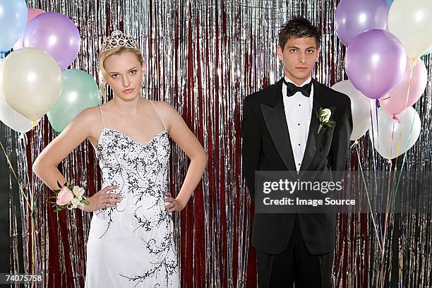 annoyed girl and boyfriend at prom - prom stock pictures, royalty-free photos & images