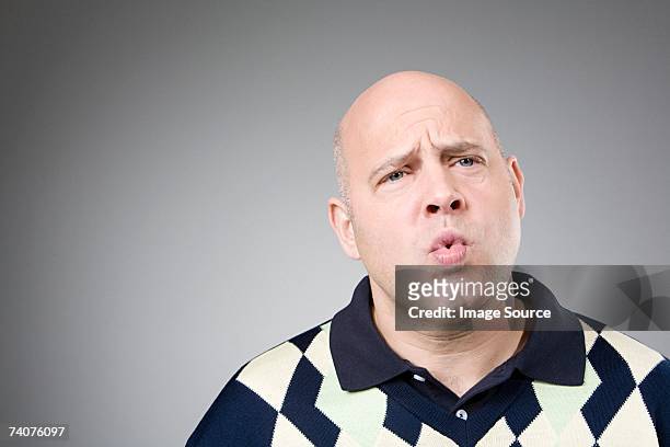man puckering - pouting stock pictures, royalty-free photos & images