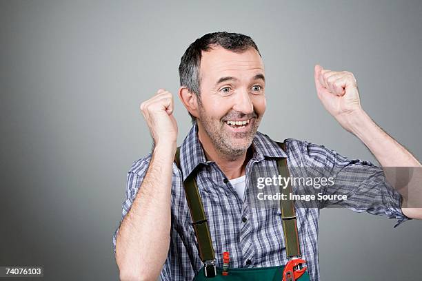 happy handyman - handyman overalls stock pictures, royalty-free photos & images