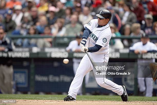 Jose Vidro of the Seattle Mariners connects with the pitch against the Kansas City Royals on April 29, 2007 at Safeco Field in Seattle, Washington....