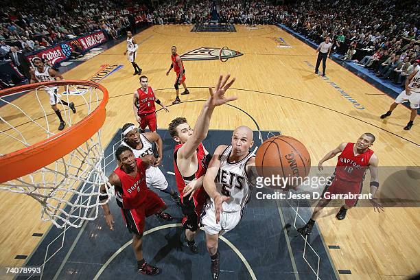 Jason Kidd of the New Jersey Nets shoots against Andrea Bargnani of the Toronto Raptors in Game Six of the Eastern Conference Quarterfinals during...