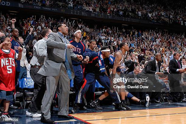The bench of the New Jersey Nets celebrates during the game against the Toronto Raptors in Game Six of the Eastern Conference Quarterfinals during...