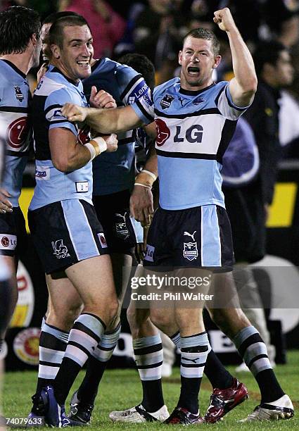 Adam Dykes of the Sharks celebrates the win on the final whistle during the round eight NRL match between the Warriors and the Cronulla Sharks at Mt...