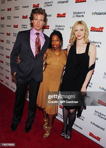 Actors Josh Meyers, Regina King, and Laura Prepon at the Stuff Magazine Party presented by Polaroid and Maker's Mark during the events for the 133rd...