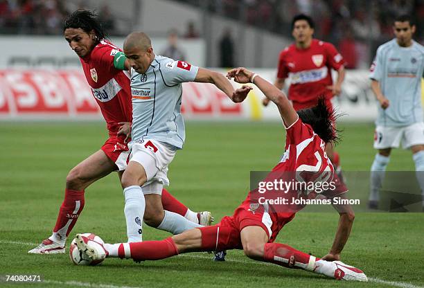 Fernando Meira and Sami Khedira of Stuttgart and Mohamed Zidan of Mainz in action during the Bundesliga match between VfB Stuttgart and FSV Mainz 05...