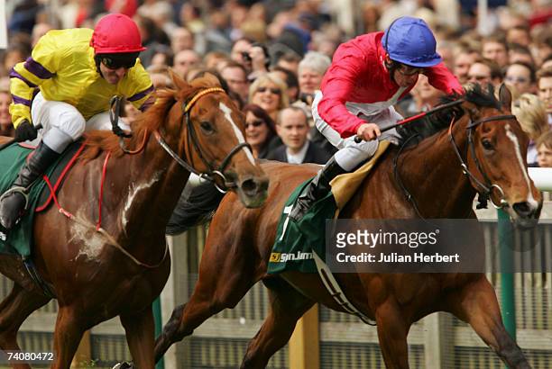 Kerrin McEvoy and Echelon get the better of the Michael Hills ridden Topatoo to land The stanjamesuk.com Dahlia Stakes Race run at Newmarket...