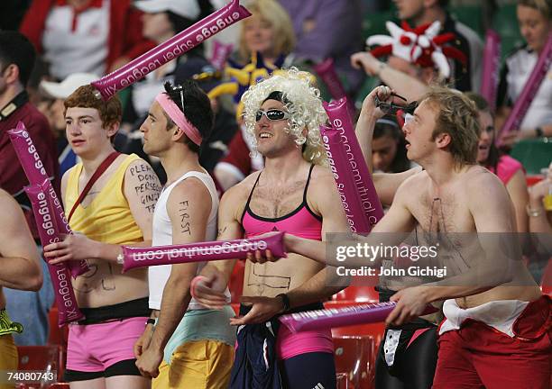 Fans amuse themselves during the Engage Super League match between Catalans Dragons and Harlequins RL at the Millennium Stadium on May 5, 2007 in...