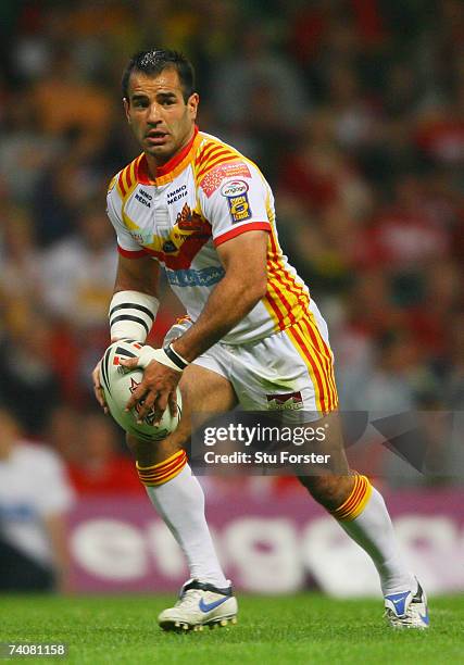 Stacey Jones of the Catalans runs with the ball during the Engage Super League match between Catalans Dragons and Harlequins RL at the Millennium...