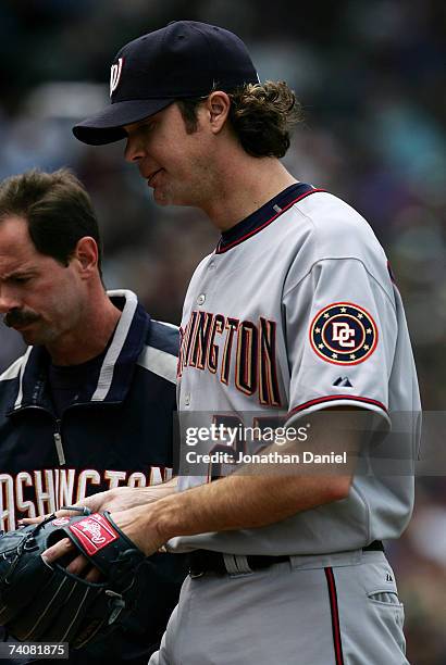 Starting pitcher John Patterson of the Washington Nationals leaves the game against the Chicago Cubs in the 3rd inning with the bases loaded and no...