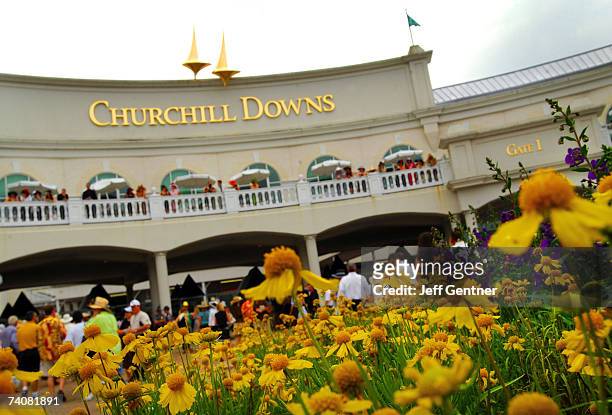 Fans gather at the entrance to the 133rd running of the Kentucky Derby at Churchill Downs on May 5, 2007 in Louisville, Kentucky.