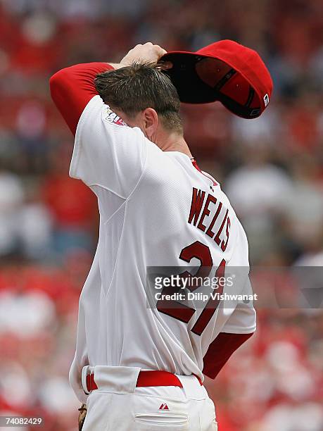Starting pitcher Kip Wells of the St. Louis Cardinals reacts to giving up two runs against the Houston Astros on May 5, 2007 at Busch Stadium in St....
