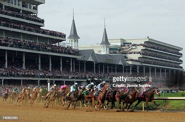 Horses round the first turn during the 133rd Kentucky Derby on May 5, 2007 at Churchill Downs in Louisville, Kentucky.