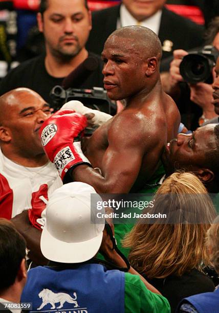 Floyd Mayweather Jr. Celebrates after defeating Oscar De La Hoya after their WBC super welterweight world championship fight at the MGM Grand Garden...