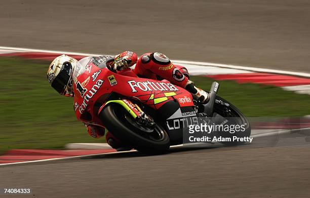 Jorge Lorenzo of Spain and team Fortuna Aprilia on his way to victory in the 250cc Motorcycle Grand Prix of China at the Shanghai International...
