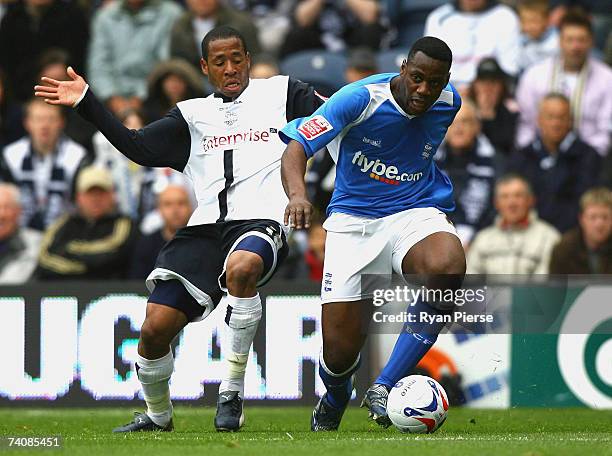 Matthew Hill of Preston North End competes for the ball against Bruno N'Gotty of Birmingham City during the Coca Cola Championship match between...