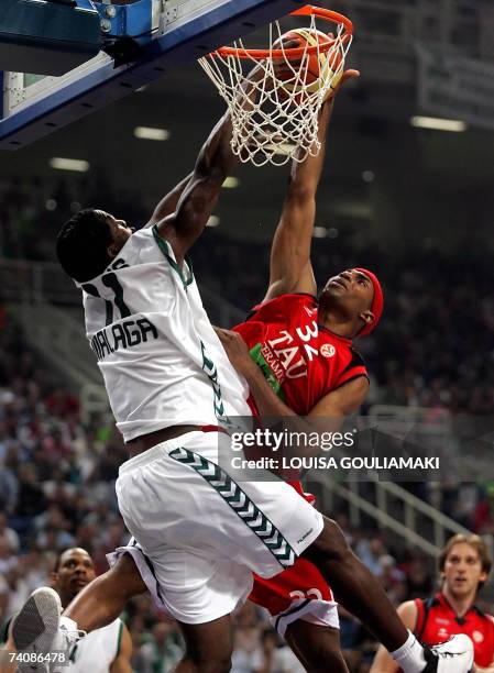 Unicaja's Malaga Florent Pietrus tries to stop Tau Ceramica Fred House during their Euroleague basketball Final Four match for the third place at the...