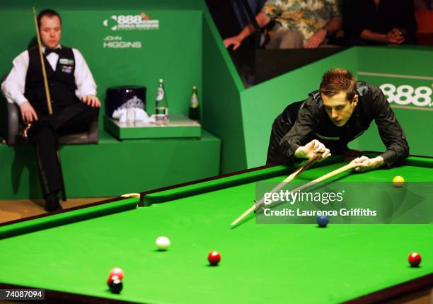 Mark Selby of England in action against John Higgins of Scotland during the Final of the 888.com World Championship at the Crucible Theatre on May 6,...