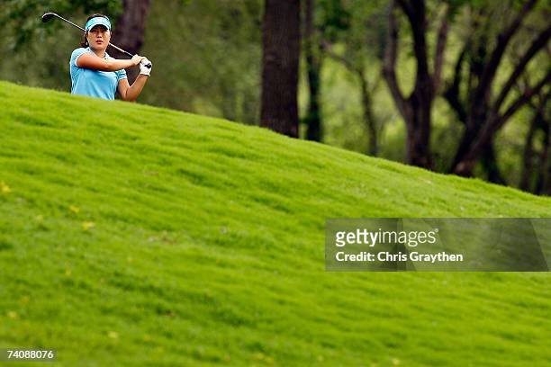 Meena Lee makes a shot from the fairway on the 17th hole during the final round of the SemGroup Championship presented by John Q. Hammons on May 6,...