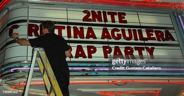 Marquee with name mispelled being corrected at Miami Beach nightclub for Christina Aguilera's end of tour wrap party in the early morning hours on...