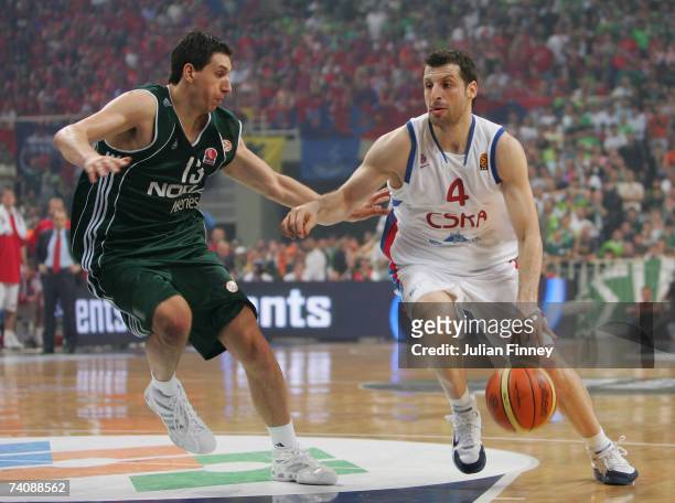 Dimitrios Diamantidis of Panathinaikos battles with Theodoros Papaloukas of CSKA Moscow during the EuroLeague Final match between Panathinaikos and...