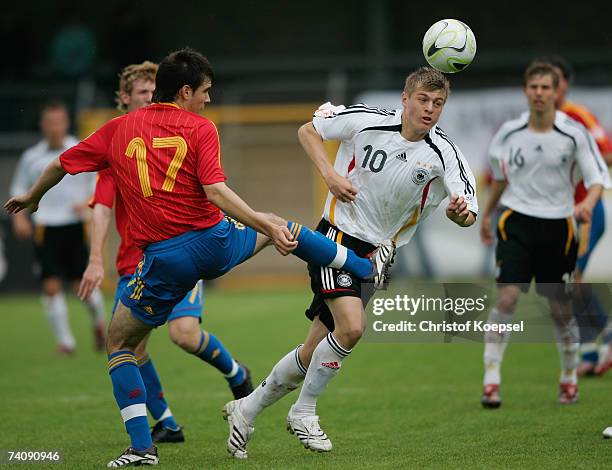 Francisco Atienza Valverde of Spain tackles Toni Kroos of Germany during the 2007 UEFA European Under 17 Championship group A match between Spain and...