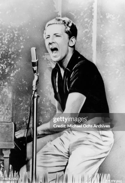 Rock and roll musician Jerry Lee Lewis performs on the back of a truck in the opening scene of the movie High School Confidential in 1958.