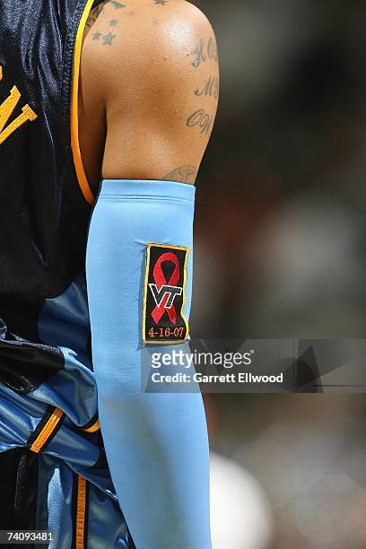 Allen Iverson of the Denver Nuggets displays a tribute to the victims of the Virginia Tech tragedy in Game Two of the Western Conference...