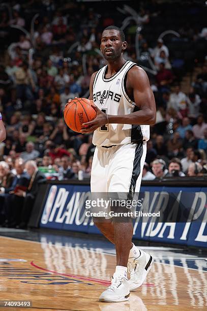 Michael Finley of the San Antonio Spurs looks for an open pass in Game Two of the Western Conference Quarterfinals against the Denver Nuggets during...