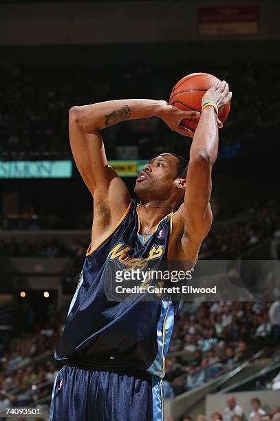 Marcus Camby of the Denver Nuggets puts a shot up in Game Two of the Western Conference Quarterfinals against the San Antonio Spurs during the 2007...