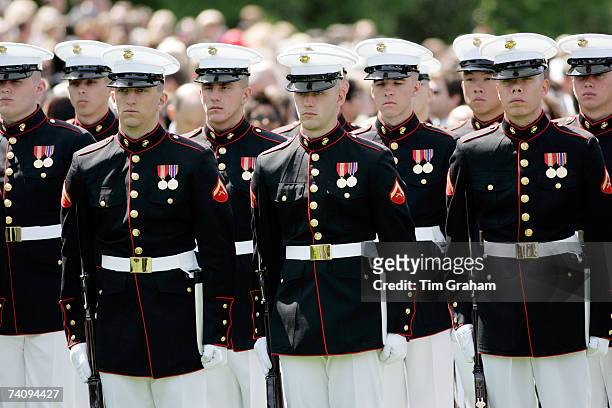 Military officers of the Army, Navy and Airforce wait for HM Queen Elizabeth II's inspection on the White House lawn on May 7, 2007 in Washington,...